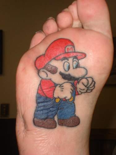 super mario brothers feet tattoo. August 7th, 2009 . By Walyou in .