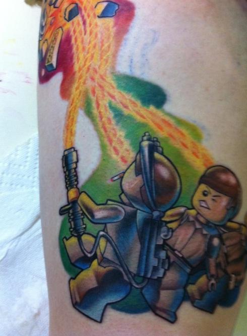 ghostbusters lego tattoo leg