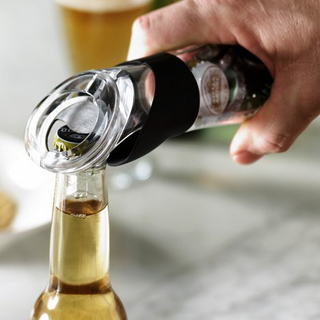 Bottle opener that collects caps