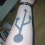 usb symbol arm tattoo