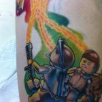 ghostbusters lego tattoo leg